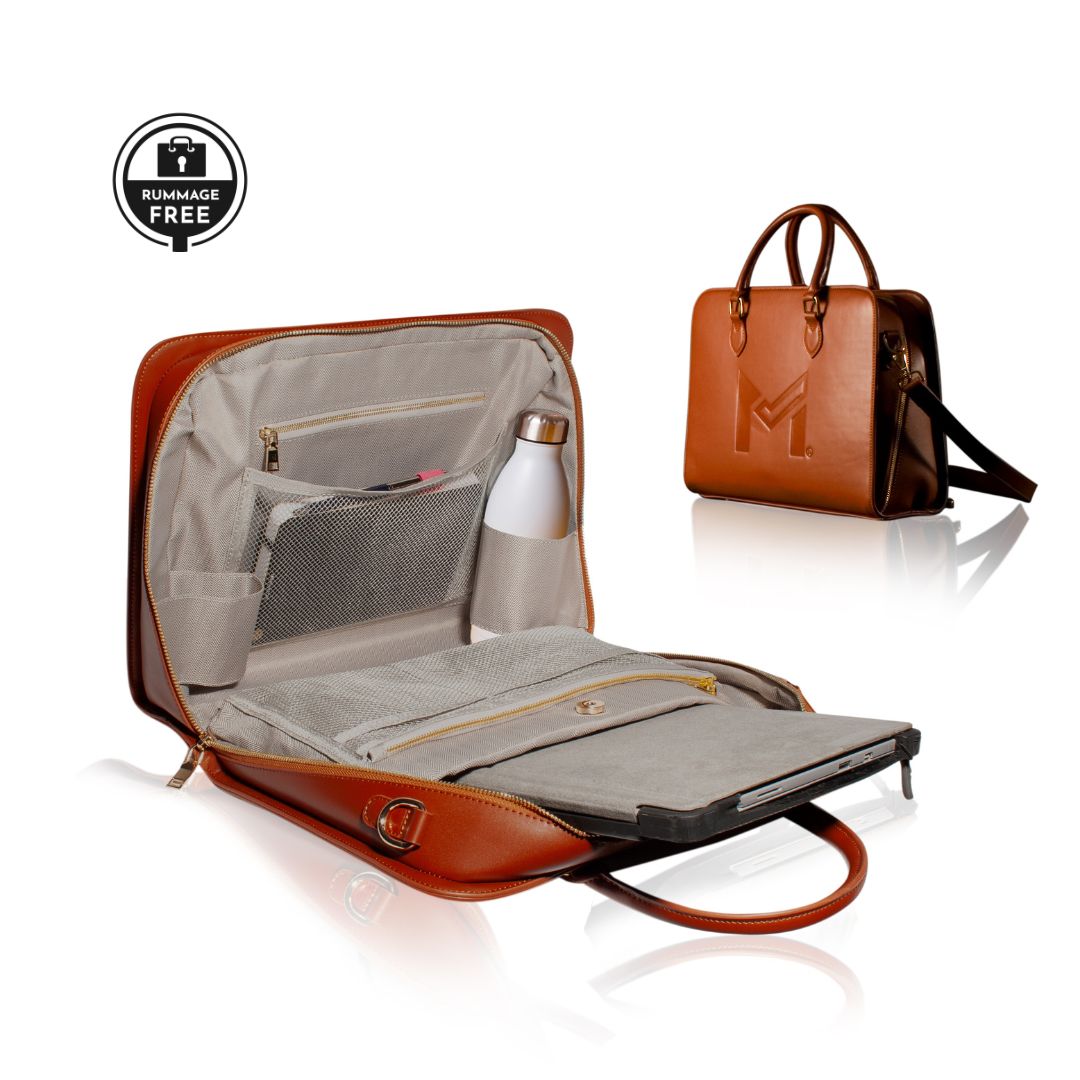 Elevate your professional image with the sleek Motion laptop handbag, made from vegan leather with gold accents, embodying the Quiet Luxury style—perfect for the Boss Lady